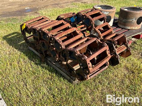 steel tracked skid steer|grouser tracks for skid steer.